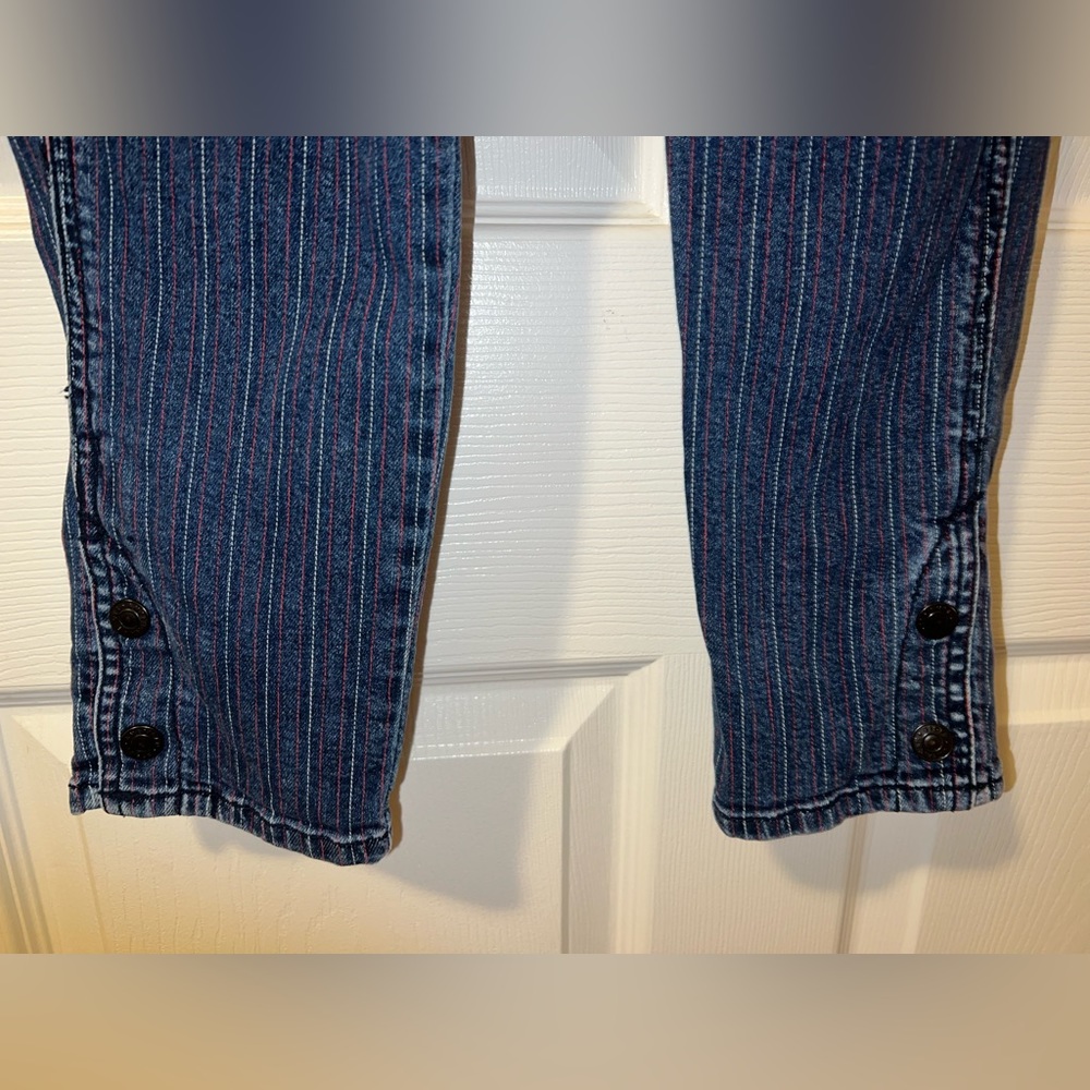size 0 red white blue American Eagle jeans, comfy, worn a little, no damage